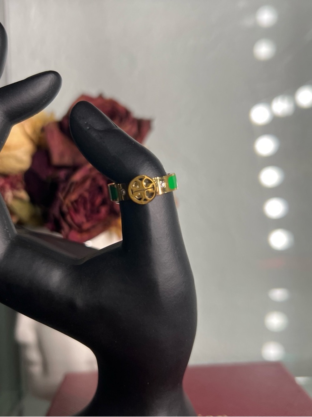 Gold and green women’s ring